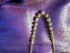 Picture of Gold Nakshi Balls and perl chain with earrings