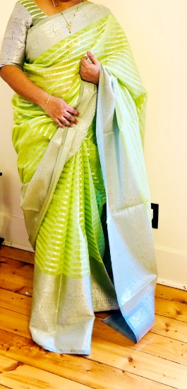 Picture of Pista color saree with big border