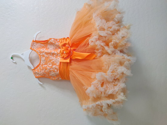 Picture of New little girl orange dress