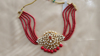 Picture of Red beads kundan choker with Jhumkis