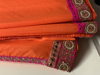 Picture of Orange and pink fancy saree