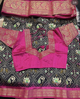 Picture of Black and pink Patola saree