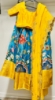 Picture of yellow and blue half saree