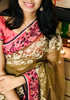 Picture of pink and lentil green color saree with pink border thread work on it