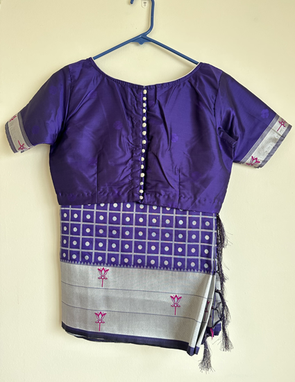 Picture of Purple saree with silver border