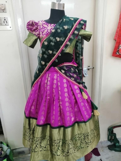 Picture of Dark pink Lehenga with  Kanchi border and bottle green Voni 2-4y