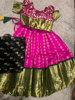 Picture of Dark pink Lehenga with  Kanchi border and bottle green Voni 2-4y