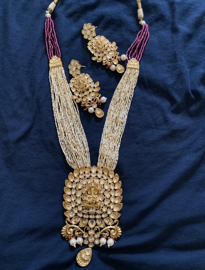 Picture of Beautiful Ganesh Haar set in pearls Mala with Ear Rings