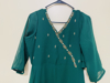 Picture of Brand New bottle green long frock