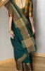 Picture of Bottle Green and yellow fancy pattu saree with 2 paired blouses