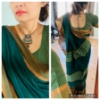 Picture of Bottle Green and yellow fancy pattu saree with 2 paired blouses