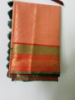 Picture of Green and orange fancy pattu saree