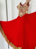 Picture of Red long frock with cutwork design
