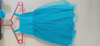 Picture of blue frock with removable ruffle layer 1-2y