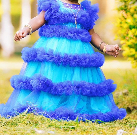 Picture of blue frock with removable ruffle layer 1-2y
