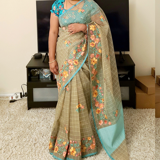 Picture of Pastel olive or blue grey color embroidered organza saree