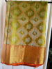 Picture of Pure kanjivaram saree in sagegreen and orange color bought at Tana event