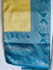 Picture of New Yellow and copper sulphate silver tissue saree