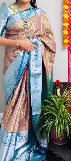 Picture of Light pista green Pattu saree and sea blue big border  saree paried with butta hands blouse