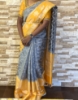 Picture of Pattu  saree with silver zari in unique gray and yellow combination