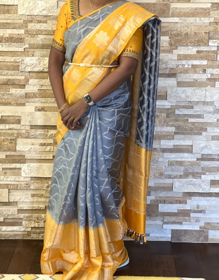 Picture of Pattu  saree with silver zari in unique gray and yellow combination