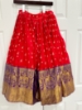 Picture of Bandhani silk lehenga with Kanchi border and A raw silk embellished purple blouse 6-8y