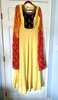 Picture of Yellow bandhani cape sleeves long dress