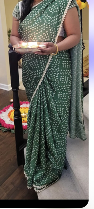 Picture of bandhini saree with maggam work blouse