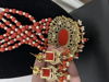 Picture of Coral beads set in gold finish