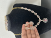 Picture of Ad set in pastel pink with bracelet
