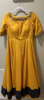 Picture of Yellow silk dress with ikkath dupatta