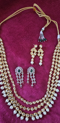 Picture of CZ earrings along with kundan set