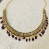 Picture of Victorian purple  kante with matching big earrings.