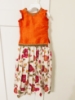 Picture of Orange and kalamkari thread work langa 2y