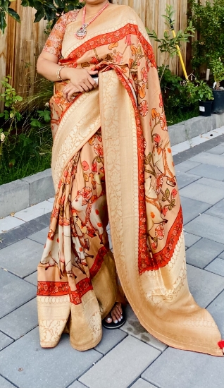 Picture of Very Elegant and trendy Pichwai print Orange-Cream Silk saree