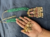 Picture of Jadau kundan lord balaji with original russian onyx emrald 