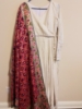 Picture of Angrakha style chikankari frock with patola dupatta