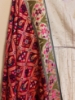Picture of Angrakha style chikankari frock with patola dupatta