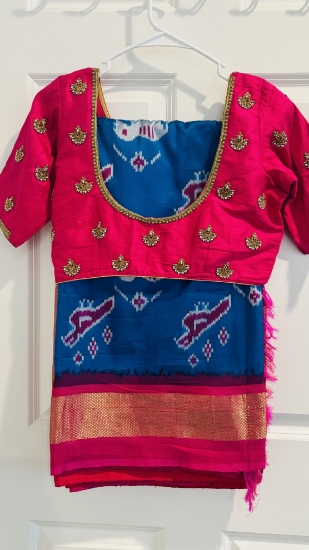 Picture of Ikat patola saree with rawsilk maggam blouse