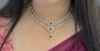 Picture of Diamond look alike stylish ruby neckset with earrings