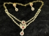 Picture of Diamond look alike stylish ruby neckset with earrings