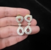 Picture of Diamond look alike stylish ruby neckset with earrings