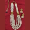 Picture of White beads haaram with Lakshmi Devi side pendants