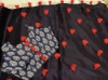 Picture of Red and navy blue tassle saree