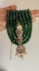 Picture of Gold sheeted Grand 4 lines greens and Swaroski pearls mala