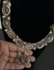 Picture of Victorian Moissanite doublet set in purple 