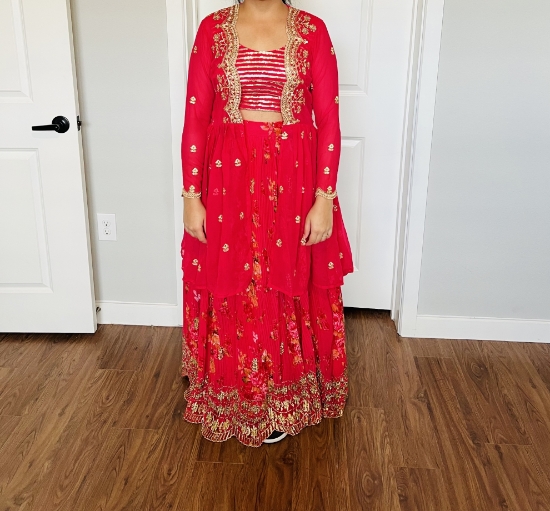 Picture of Red floral lehenga with cape