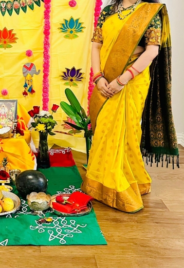 Picture of Bottle green and yellow copper zari saree
