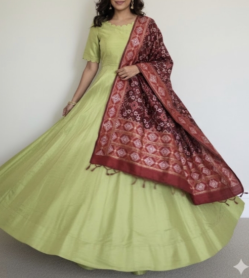 Picture of never worn Parrot Green Anarkali with red patola dupatta