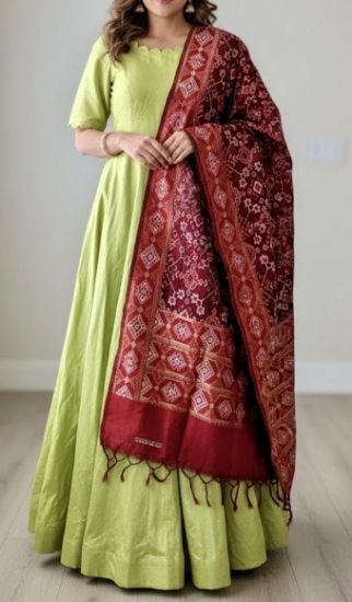 Picture of never worn Parrot Green Anarkali with red patola dupatta